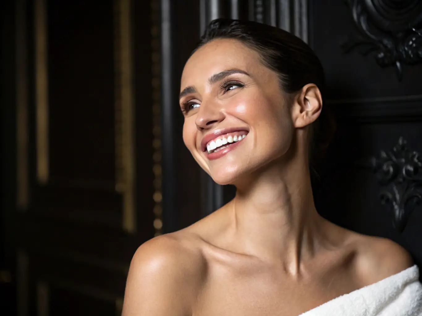 A close-up image of a patient smiling radiantly after undergoing a teeth whitening procedure at crossdentalcare.com, showcasing their bright, white teeth.